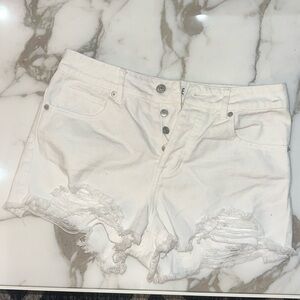 Brandy Melville women’s white jean shorts are ripped style size 29